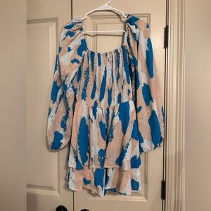 Blue, tan, and white ruffle romper